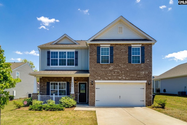 724 Channing Creek Ln, Lexington, SC 29072 - view of front of house featuring board and batten siding, a porch, brick siding, driveway, and a front yard