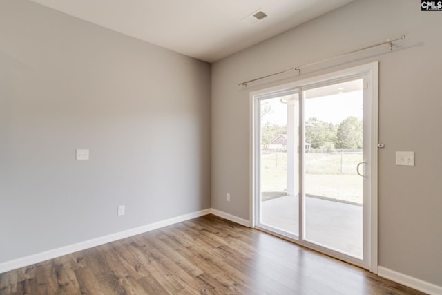 724 Channing Creek Ln, Lexington, SC 29072 - spare room featuring wood finished floors and baseboards