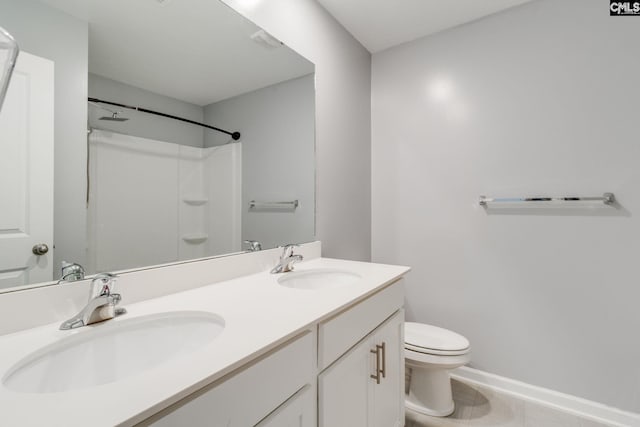 724 Channing Creek Ln, Lexington, SC 29072 - bathroom with toilet, double vanity, a shower, and baseboards