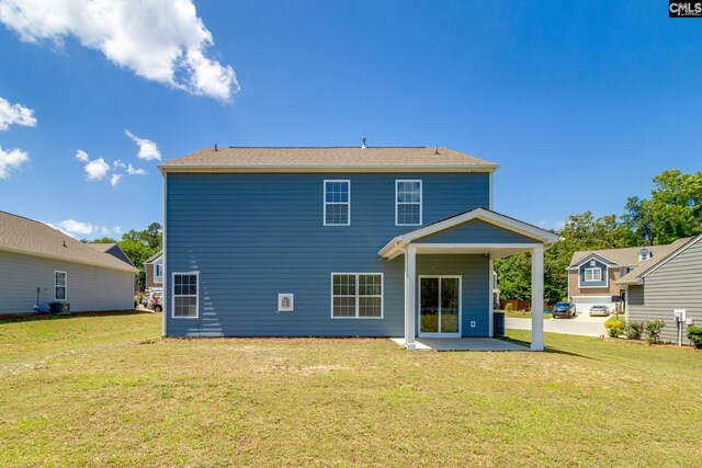 724 Channing Creek Ln, Lexington, SC 29072 - rear view of house featuring a patio, a yard, and cooling unit