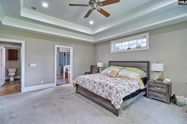 117 Shoal Creek Ln, Blythewood, SC 29016 - carpeted bedroom with crown molding, a tray ceiling, baseboards, ensuite bathroom, and recessed lighting