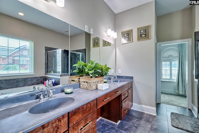 117 Shoal Creek Ln, Blythewood, SC 29016 - full bathroom with healthy amount of natural light, double vanity, a stall shower, and tile patterned flooring