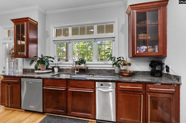 279 Canterwood Rd, Irmo, SC 29063 - kitchen featuring dishwasher, a sink, light wood-style flooring, dark stone counters, and dark brown cabinets