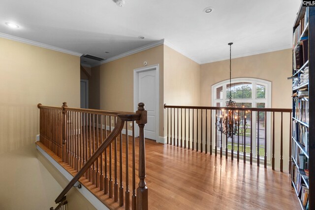 279 Canterwood Rd, Irmo, SC 29063 - corridor featuring an upstairs landing, a chandelier, wood finished floors, baseboards, and ornamental molding