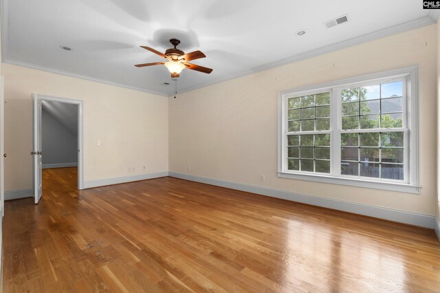 279 Canterwood Rd, Irmo, SC 29063 - spare room with crown molding, a ceiling fan, baseboards, and wood finished floors