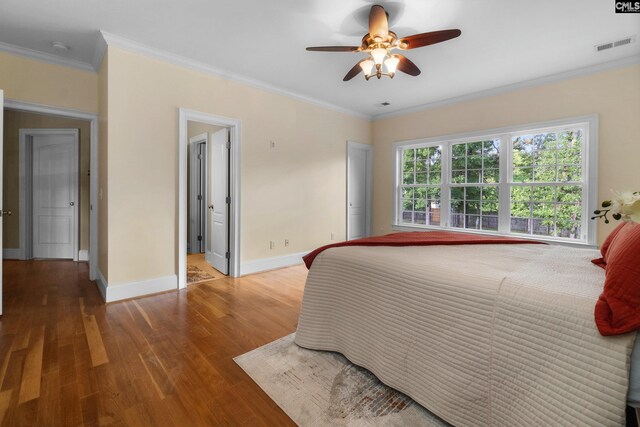 279 Canterwood Rd, Irmo, SC 29063 - bedroom with wood finished floors, baseboards, ornamental molding, and a ceiling fan