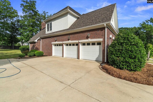 279 Canterwood Rd, Irmo, SC 29063 - view of side of property featuring driveway, brick siding, and a shingled roof