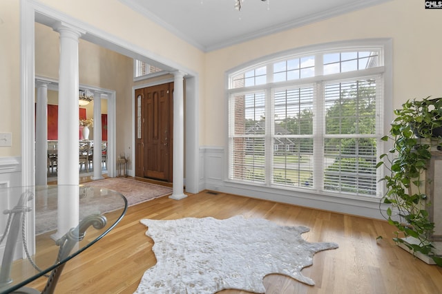 279 Canterwood Rd, Irmo, SC 29063 - foyer with ornate columns, crown molding, wainscoting, and wood finished floors