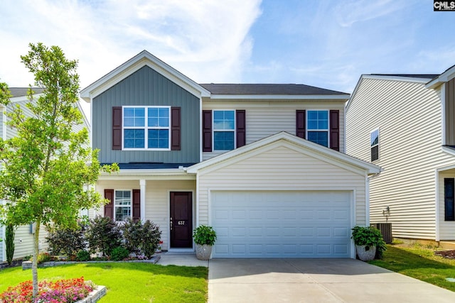 637 Penfolds Way, Blythewood, SC 29016 - view of front facade featuring board and batten siding, driveway, a front lawn, and a garage