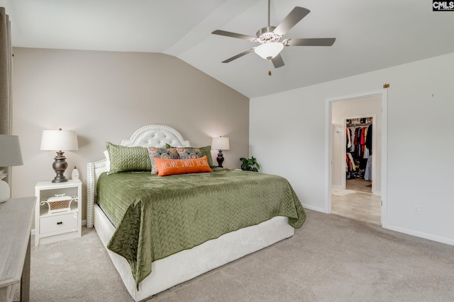 637 Penfolds Way, Blythewood, SC 29016 - bedroom featuring vaulted ceiling, carpet, a walk in closet, baseboards, and a ceiling fan