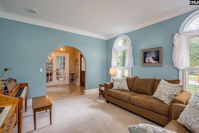 616 Brandon Ct, Lexington, SC 29072 - living room with arched walkways, crown molding, baseboards, french doors, and light tile patterned flooring