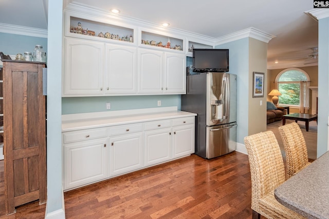 616 Brandon Ct, Lexington, SC 29072 - kitchen featuring stainless steel fridge with ice dispenser, wood finished floors, white cabinetry, light countertops, and ornamental molding