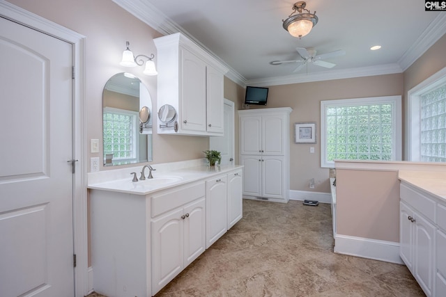 616 Brandon Ct, Lexington, SC 29072 - bathroom with two vanities, ceiling fan, ornamental molding, plenty of natural light, and baseboards
