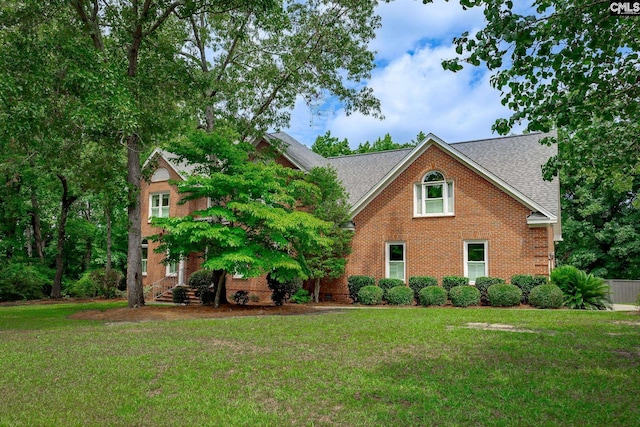 616 Brandon Ct, Lexington, SC 29072 - view of front of house with roof with shingles, a front yard, and brick siding