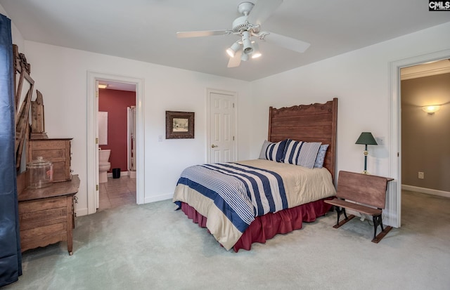616 Brandon Ct, Lexington, SC 29072 - bedroom with carpet floors, baseboards, a ceiling fan, and connected bathroom