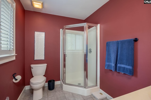 616 Brandon Ct, Lexington, SC 29072 - bathroom featuring a shower stall, toilet, baseboards, and tile patterned floors