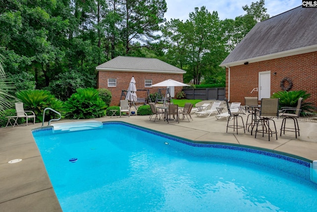 616 Brandon Ct, Lexington, SC 29072 - view of pool featuring a patio, view of scattered trees, and outdoor dining area
