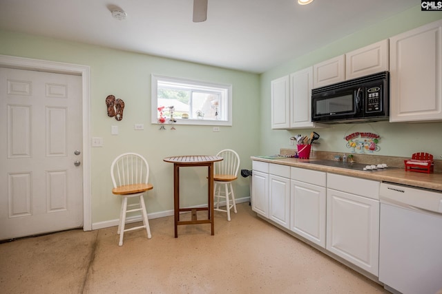616 Brandon Ct, Lexington, SC 29072 - kitchen with black appliances, white cabinetry, baseboards, and light countertops