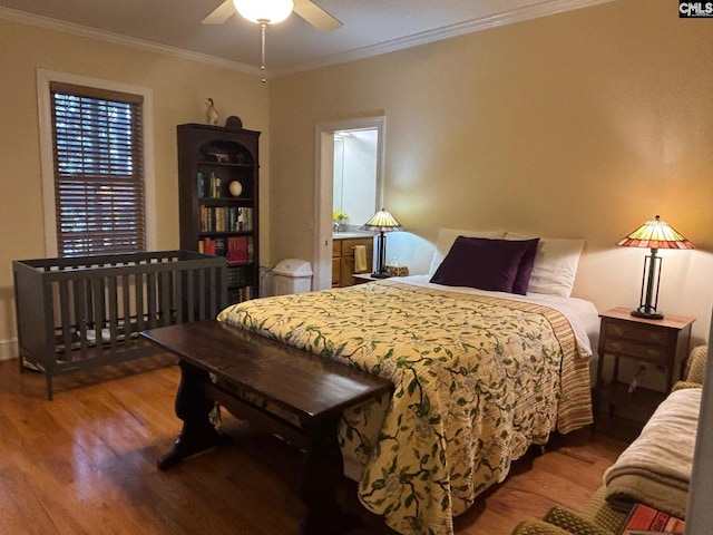 1225 Wateree Rd, Winnsboro, SC 29180 - bedroom with wood finished floors, crown molding, and ceiling fan
