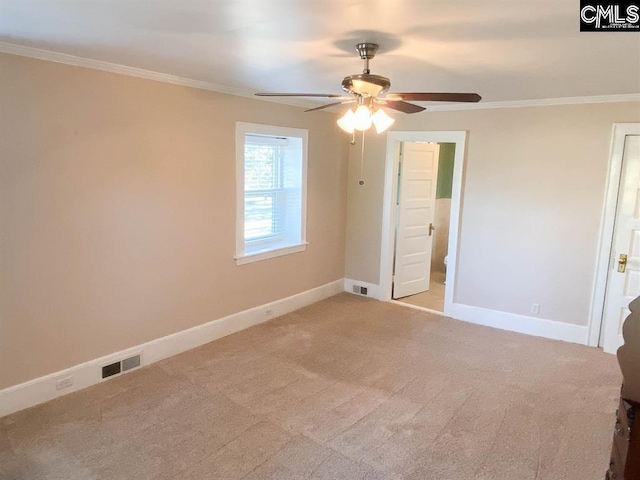 2825 Pruitt Dr, Columbia, SC 29204 - unfurnished bedroom with crown molding, carpet floors, baseboards, and ensuite bathroom