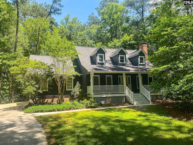 141 Runneymede Dr, Blythewood, SC 29016 - cape cod-style house with a porch, a chimney, a front lawn, and roof with shingles