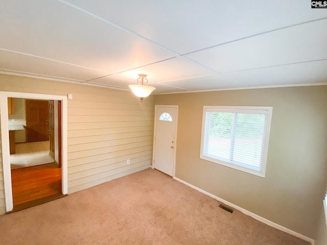 141 Runneymede Dr, Blythewood, SC 29016 - entryway featuring light carpet, crown molding, and baseboards