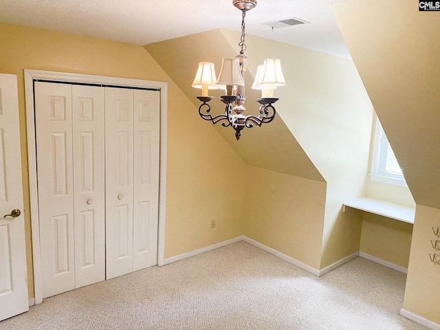 141 Runneymede Dr, Blythewood, SC 29016 - additional living space with a chandelier, carpet, baseboards, and lofted ceiling