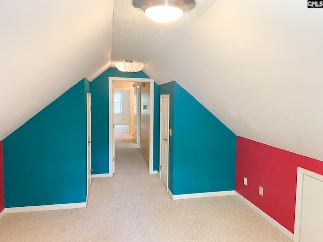 141 Runneymede Dr, Blythewood, SC 29016 - bonus room featuring carpet, vaulted ceiling, and baseboards