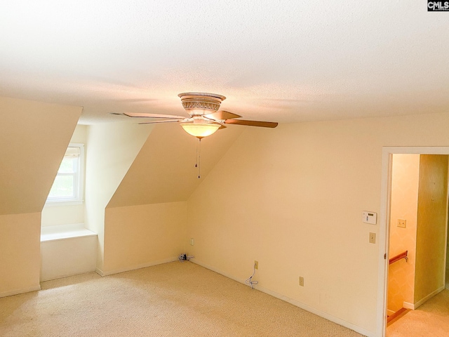 141 Runneymede Dr, Blythewood, SC 29016 - additional living space featuring ceiling fan, vaulted ceiling, light carpet, and baseboards