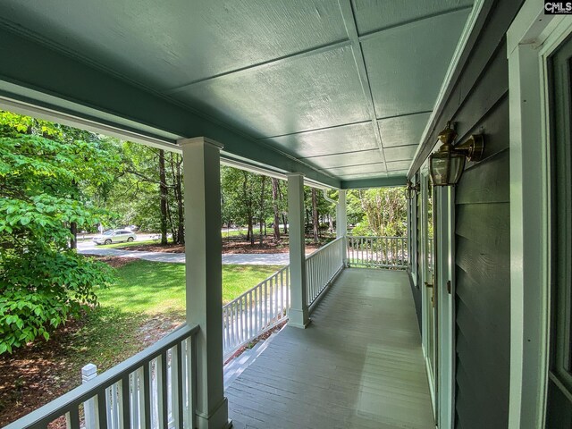141 Runneymede Dr, Blythewood, SC 29016 - wooden porch featuring a yard