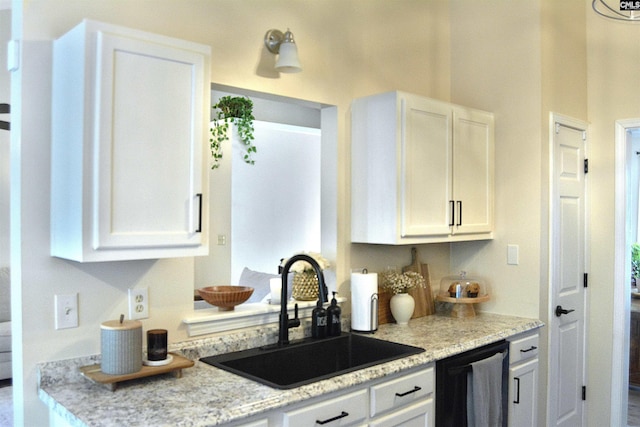25 Elcock Cir, Irmo, SC 29063 - kitchen featuring a sink, dishwasher, white cabinets, and light stone counters