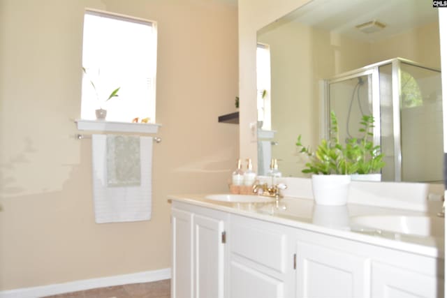 25 Elcock Cir, Irmo, SC 29063 - full bathroom with double vanity, a shower stall, and baseboards