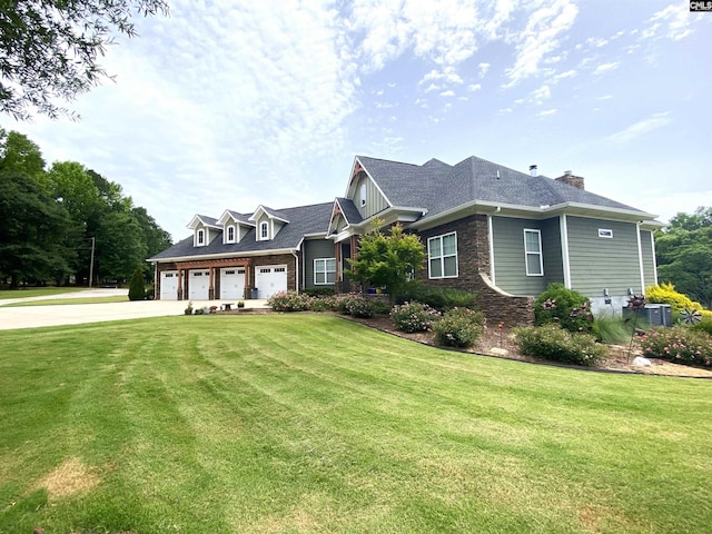 132 Systems Ln, Columbia, SC 29212 - view of front of house featuring concrete driveway, a front lawn, central air condition unit, and a chimney