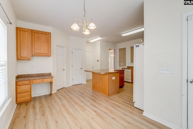 1113 Walden Place Dr, Elgin, SC 29045 - kitchen with white appliances, light wood-style floors, a kitchen island, and a chandelier