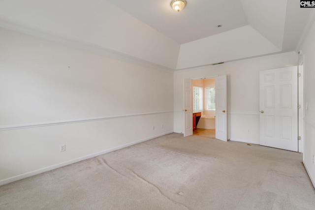 1113 Walden Place Dr, Elgin, SC 29045 - unfurnished bedroom with light carpet, baseboards, a tray ceiling, and connected bathroom