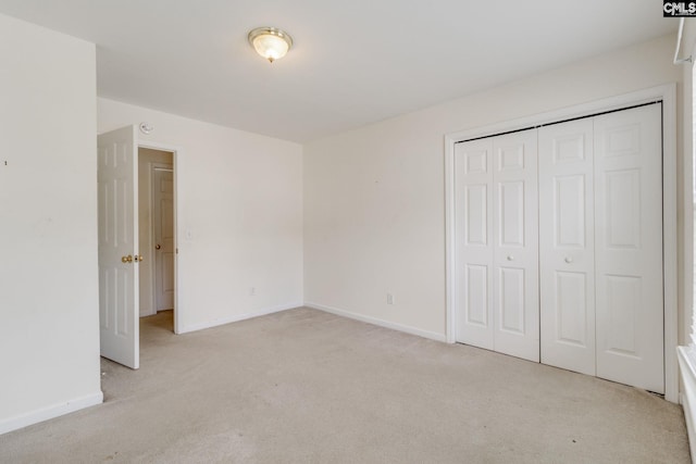 1113 Walden Place Dr, Elgin, SC 29045 - unfurnished bedroom featuring light carpet, baseboards, and a closet
