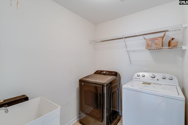 1113 Walden Place Dr, Elgin, SC 29045 - washroom featuring washing machine and clothes dryer and baseboards