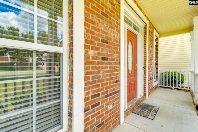 1113 Walden Place Dr, Elgin, SC 29045 - doorway to property featuring brick siding and covered porch