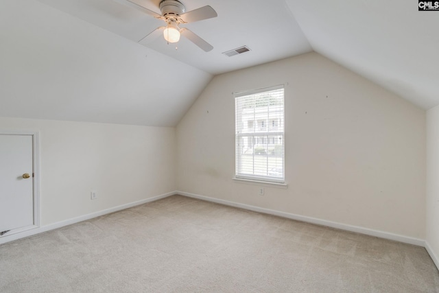 1113 Walden Place Dr, Elgin, SC 29045 - bonus room with light carpet, lofted ceiling, a ceiling fan, and baseboards
