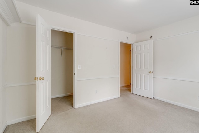 1113 Walden Place Dr, Elgin, SC 29045 - unfurnished bedroom featuring carpet, baseboards, a walk in closet, and a closet