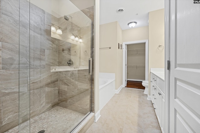 1324 Pulaski St Unit A105, Columbia, SC 29201 - bathroom with a shower stall, a garden tub, vanity, and a walk in closet