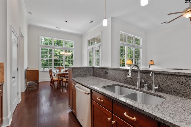 135 Bay Wren Rd, Blythewood, SC 29016 - kitchen featuring stainless steel dishwasher, a sink, ornamental molding, light stone counters, and pendant lighting