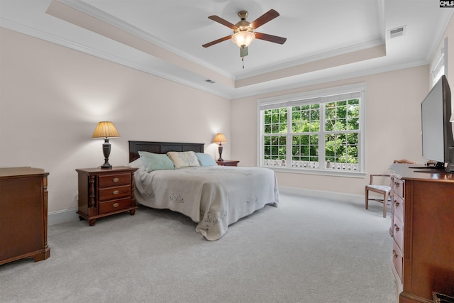 135 Bay Wren Rd, Blythewood, SC 29016 - bedroom featuring a tray ceiling, crown molding, light colored carpet, baseboards, and ceiling fan