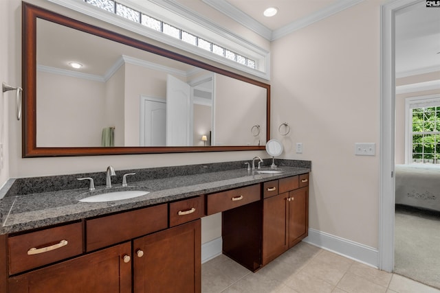 135 Bay Wren Rd, Blythewood, SC 29016 - bathroom with double vanity, baseboards, tile patterned floors, crown molding, and ensuite bathroom