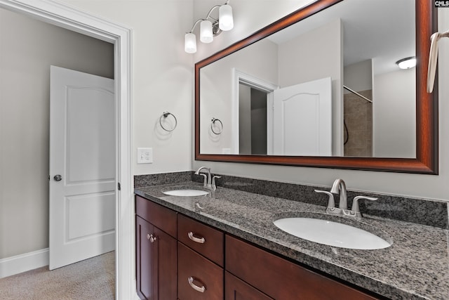 135 Bay Wren Rd, Blythewood, SC 29016 - bathroom featuring double vanity, a shower, and baseboards