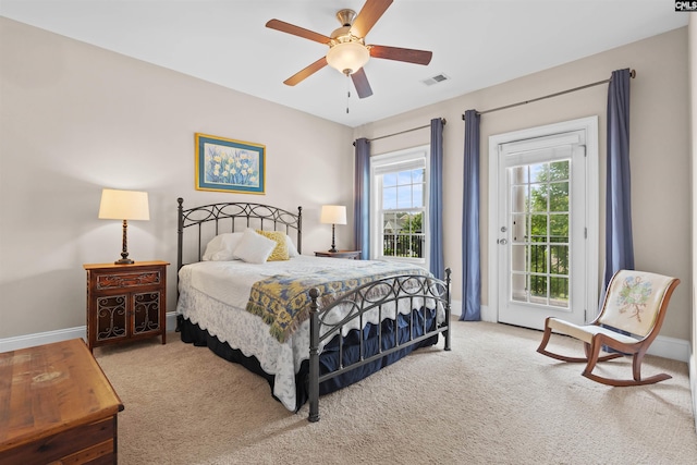 135 Bay Wren Rd, Blythewood, SC 29016 - bedroom with access to exterior, carpet floors, baseboards, and a ceiling fan