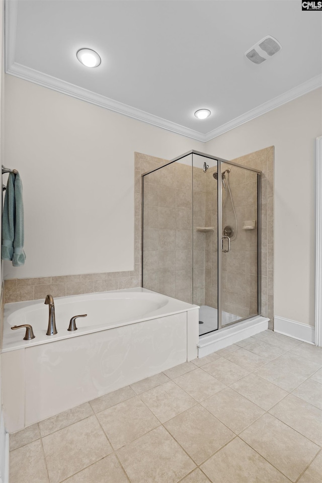 135 Bay Wren Rd, Blythewood, SC 29016 - bathroom featuring a garden tub, a shower stall, crown molding, and tile patterned flooring