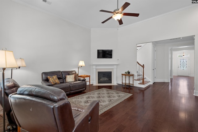 135 Bay Wren Rd, Blythewood, SC 29016 - living room with stairs, a ceiling fan, ornamental molding, hardwood / wood-style floors, and baseboards