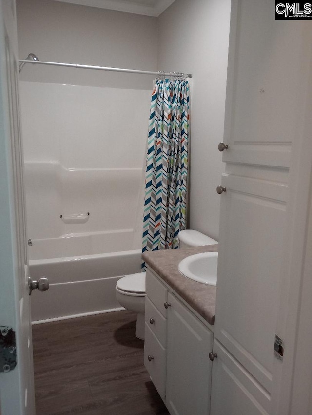 1699 Green Hill Rd, Lugoff, SC 29078 - bathroom featuring shower / bath combination with curtain, wood finished floors, vanity, and toilet