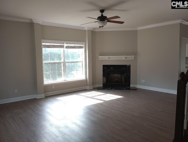 1699 Green Hill Rd, Lugoff, SC 29078 - unfurnished living room featuring wood finished floors, a ceiling fan, ornamental molding, a fireplace, and baseboards